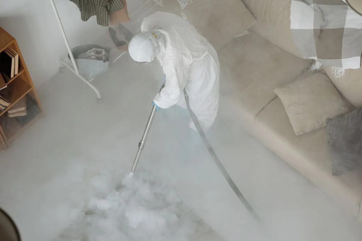 Biohazard cleanup technician in protective equipment, Keewaydin, Minneapolis, MN